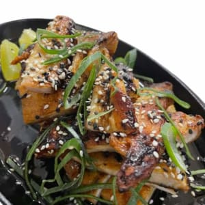 Malaya de cerdo al sarten de hierro con salsa agridulce