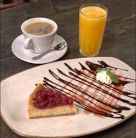 Cheesecake con Café o Té y Jugo de Naranja Thumbnail
