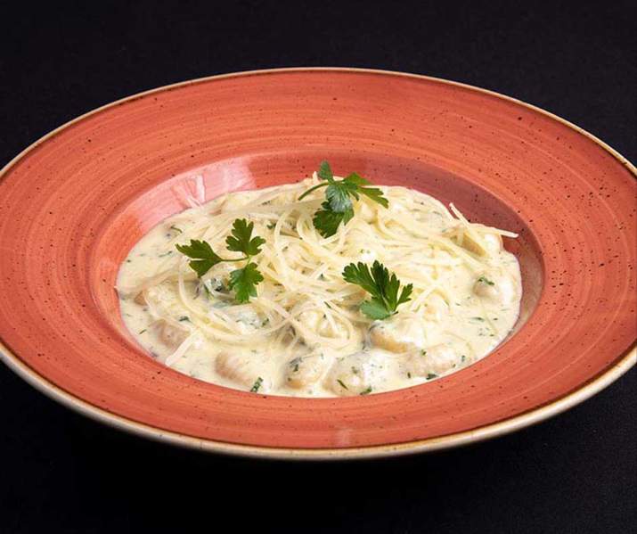 Ñoquis con Salsa de 4 Quesos (Azul,Cabra,Gruyere y Mozzarella) y Aceite de Trufa Thumbnail